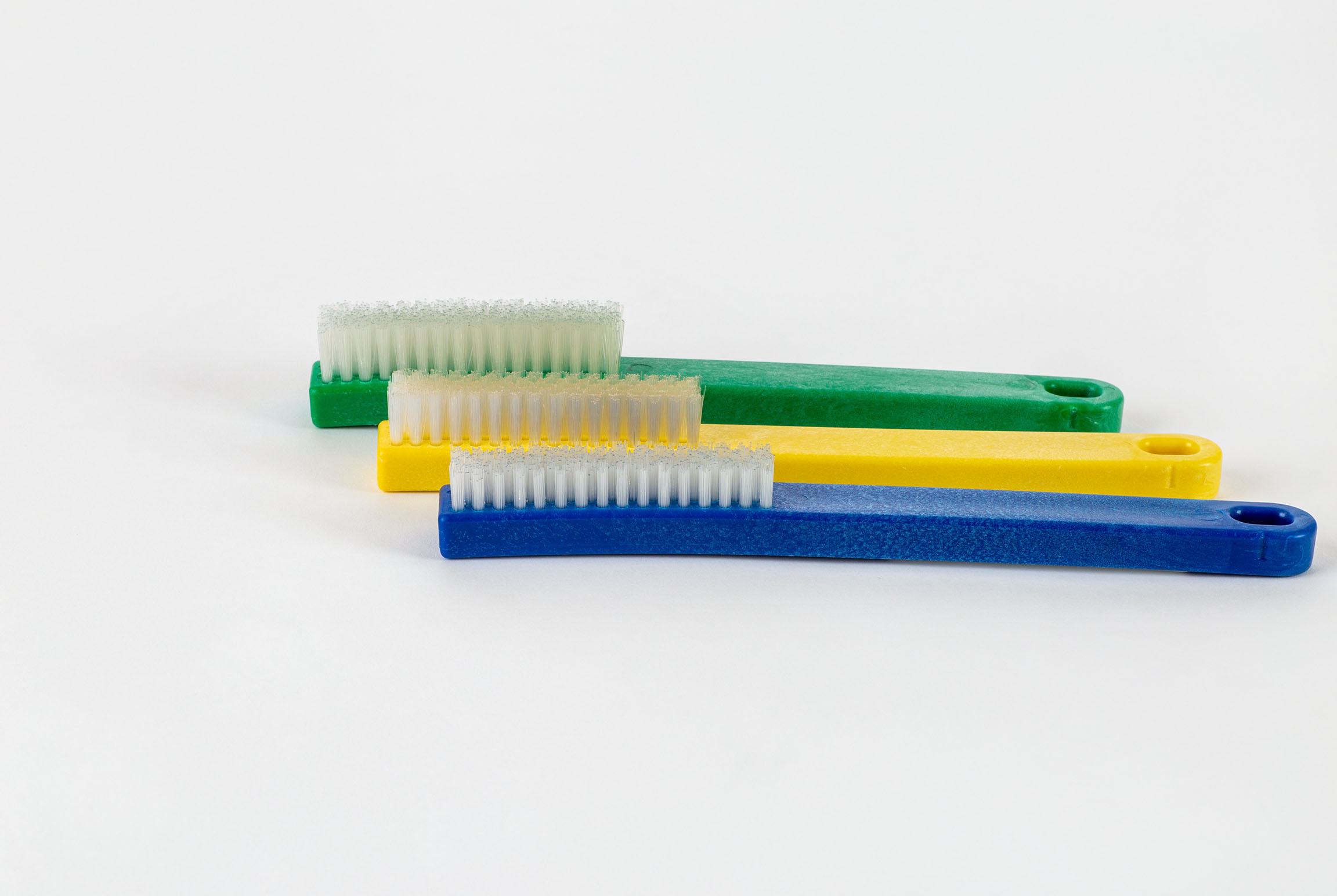 Surface cleaning brushes